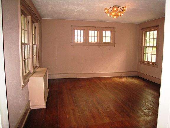 Dining Room with windows on three walls