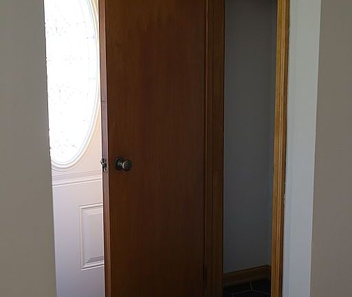 Tiled coat closet 