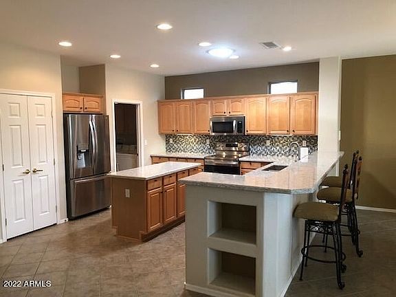 4th image of 16423 W Desert Lily Dr