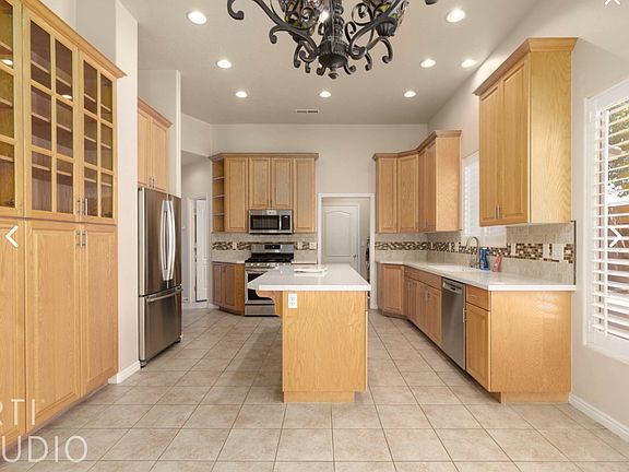 Large Kitchen, beautiful counters, lots of cabinets, newer refrigerator, stove, microwave, and dish washer