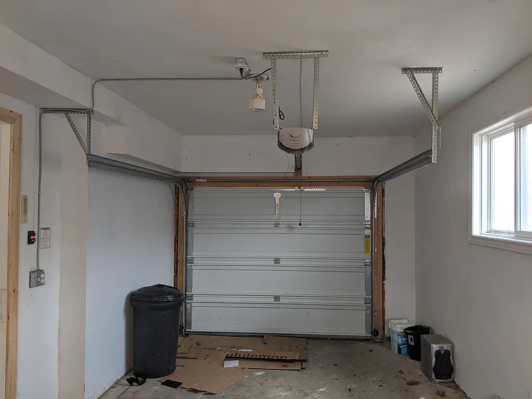 Garage with remote door opener.