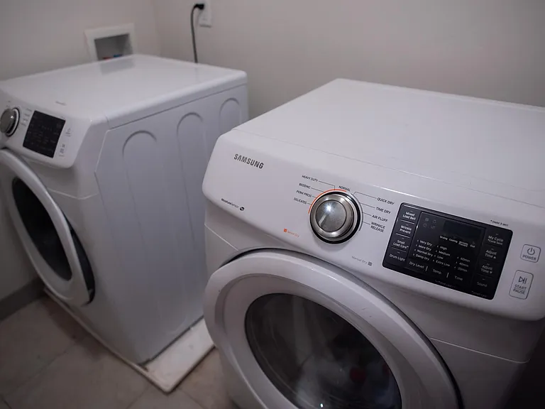 Laundry room with washer and dryer