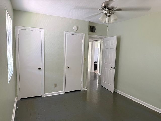 2nd bedroom with 2 closets, has ceiling fan