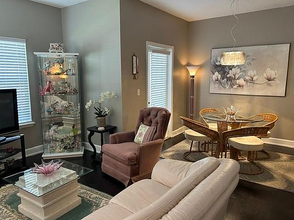 LIVING ROOM & DINING AREA OPEN FLOOR PLAN