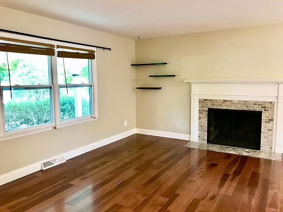 Living room w/ cozy fireplace