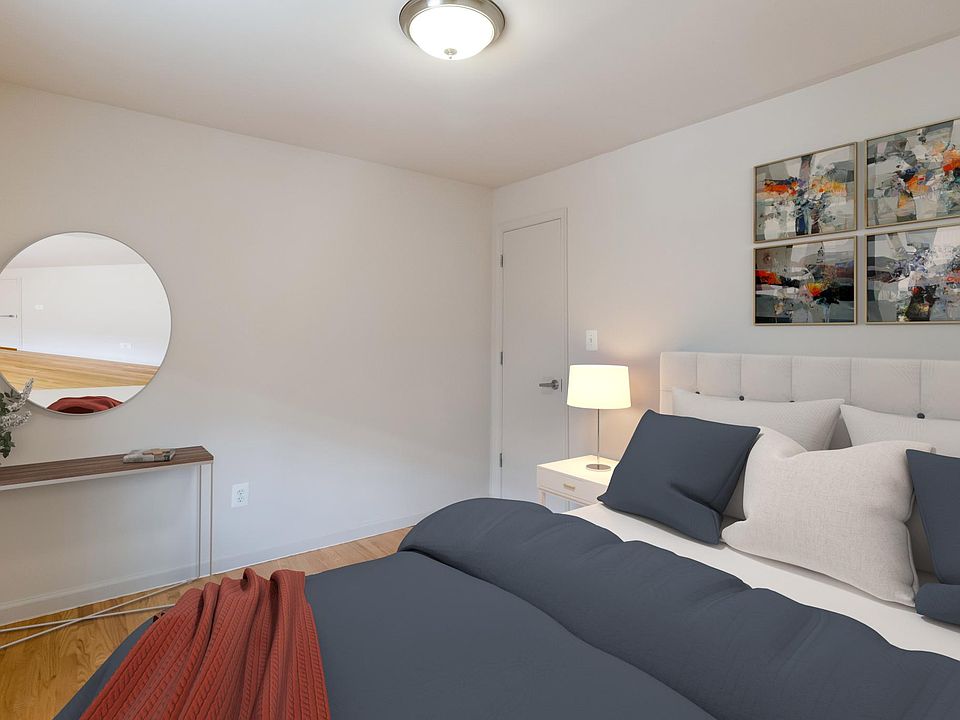 Bedroom with walk in closet. Virtually staged.