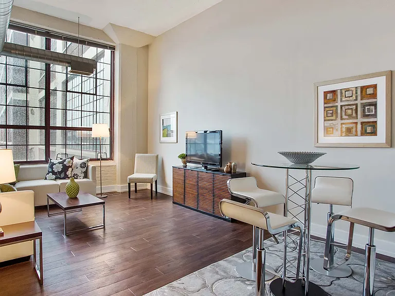 Loft-style homes with wood flooring throughout