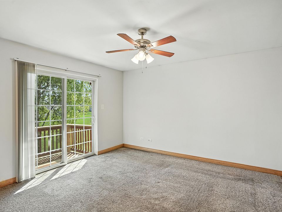 Large master bedroom with walkout balcony and private bathroom.