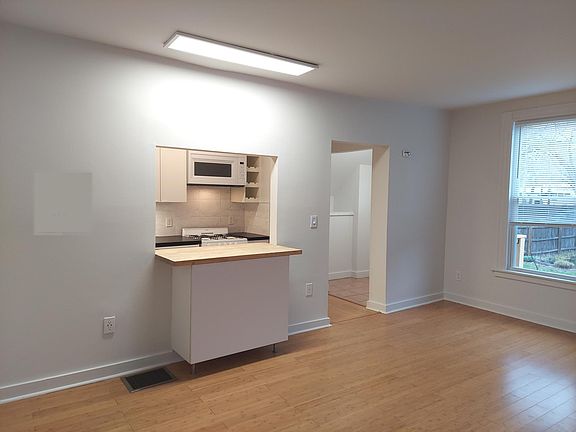 LR to Kitchen, vestibule thru door to rt