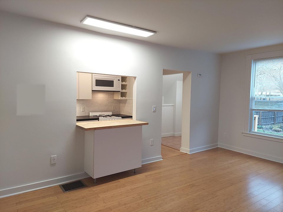LR to Kitchen, vestibule thru door to rt