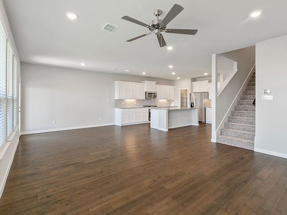 Open first floor in the Ryder home plan by Trophy Signature Homes - REPRESENTATIVE PHOTO