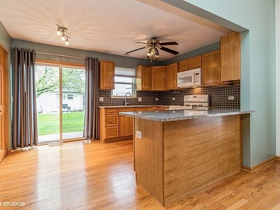 Granite Island separates the kitchen from the Living Room