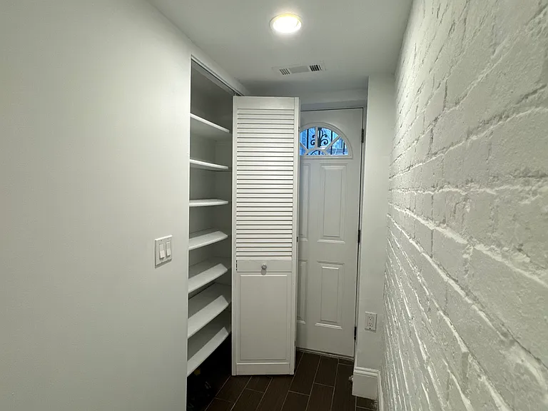 Second closet and Rear exit for the first bedroom.