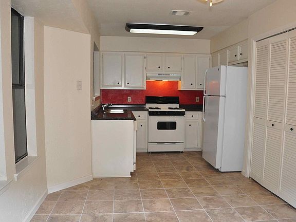 Kitchen with washer dryer closet