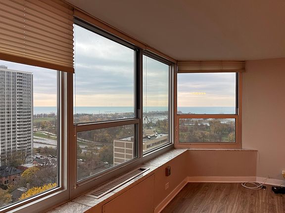 Living room view of Lake Michigan and Montrose Harbor