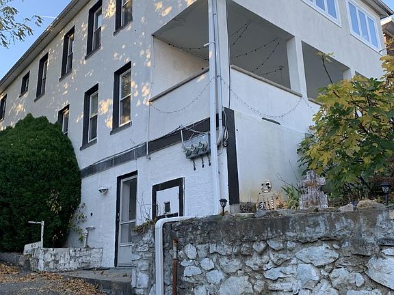 ANOTHER VIEW OF THE HOUSE, LOCATED ON A QUIET STREET