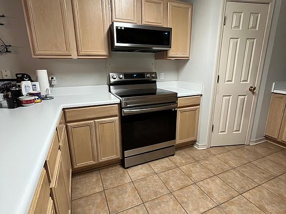 Brand New Top of the Line Stainless Stove and Hood with Microwave!