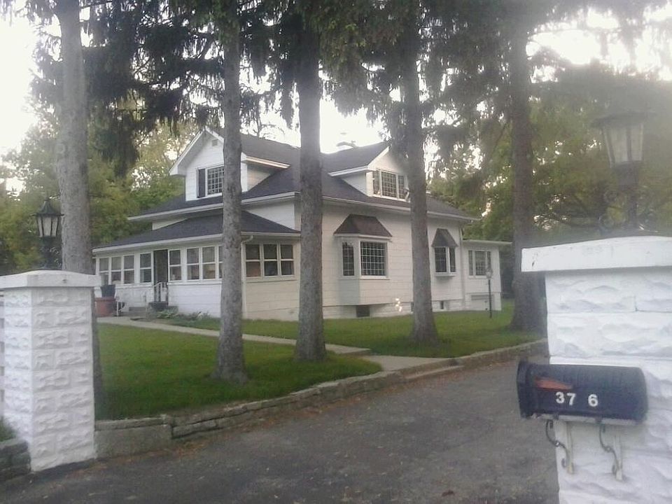 House photo taken from street.