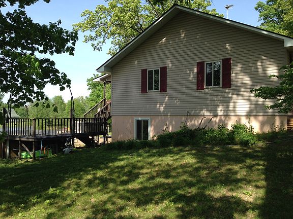 Side yard, view of pool deck