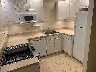 Kitchen with gas stove and electric oven