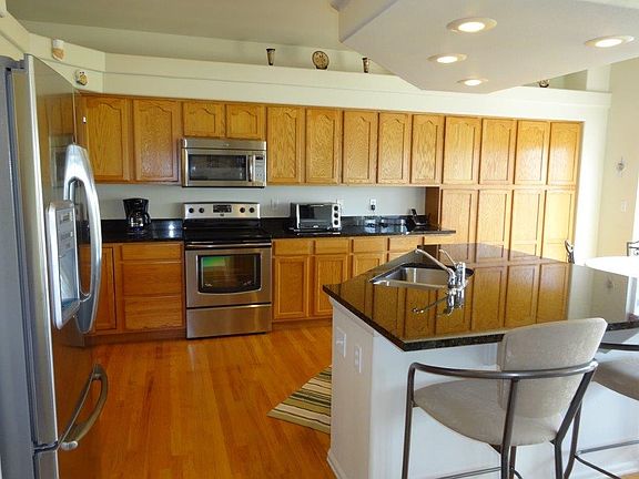 Hardwood Floor & Grantie Countertops In Kitchen!