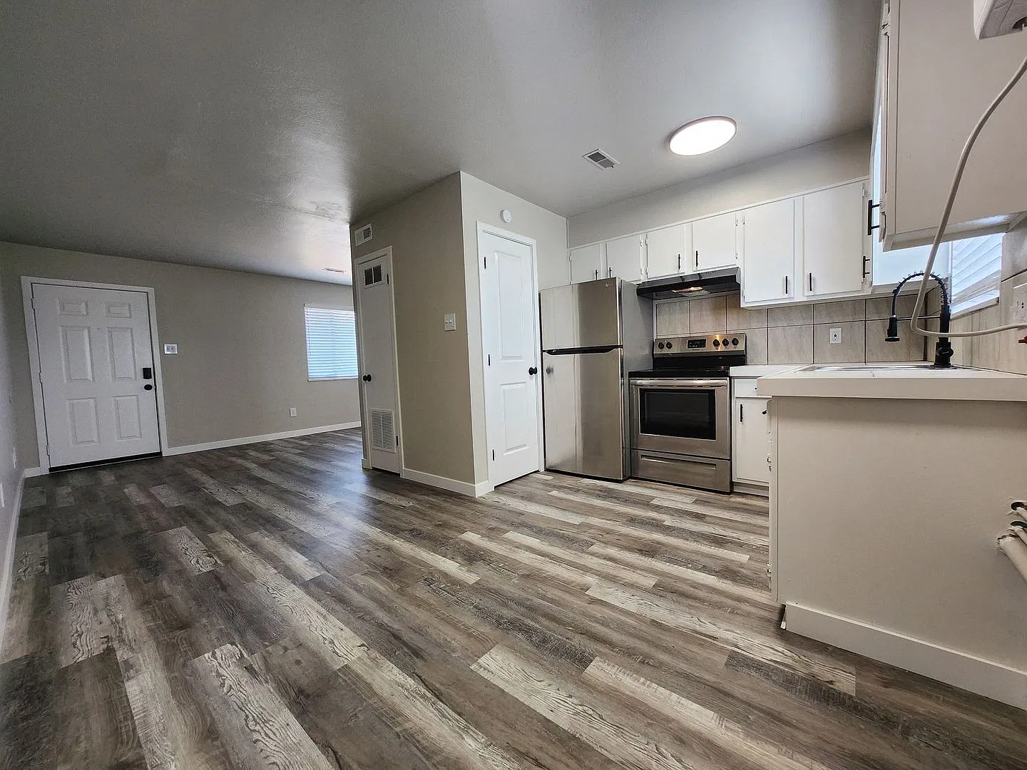 Updated 2-Bedroom Apartment | Stainless Steel Appliances, In-Unit Laundry Hookups & A/C! — Photo 3