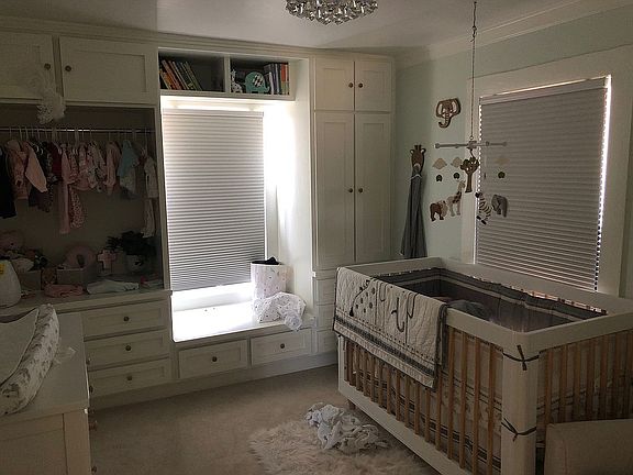 Bedroom with custom cabinets