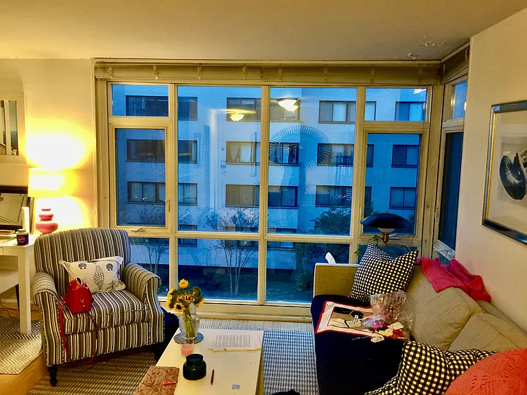 Living room floor to ceiling views. Home office to the left.