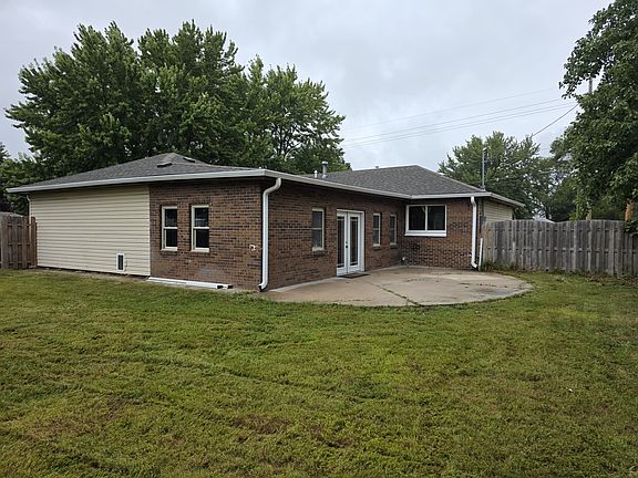 rear patio off the family room and bedroom 3