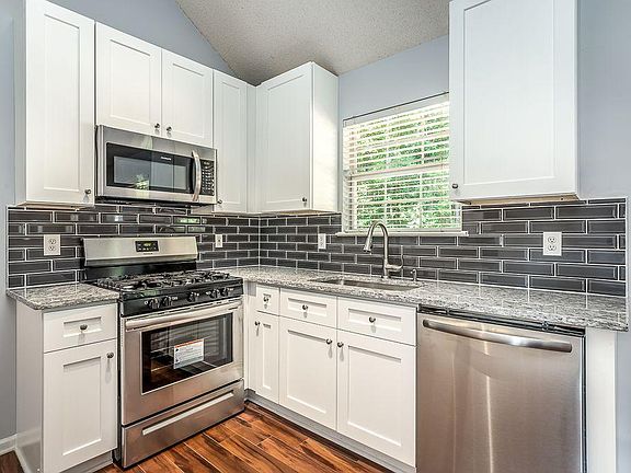 BRAND NEW kitchen - appliances and cabinets!