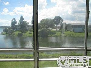water view from enclosed florida room