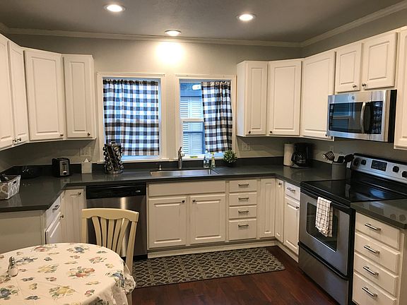 Large kitchen with lot of cabinet space, eat in space, new dish washer and new refrigerator