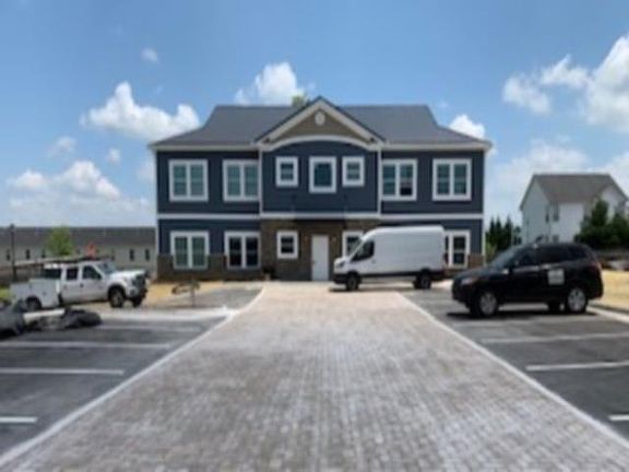 Front of building and parking lot