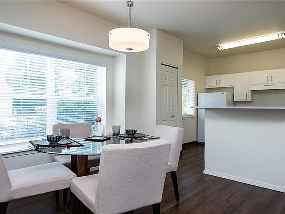 Village at Main Street | Spacious Kitchen with Adjacent Dining Room with Plank Style Flooring