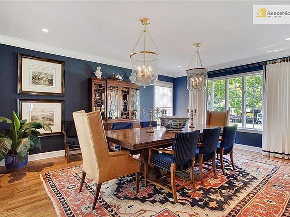 Formal dining room has been completely updated and overlooks spacious front yard