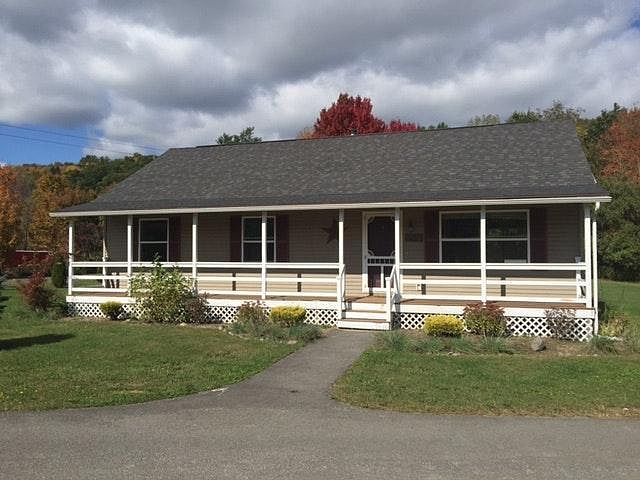 Freshly painted. Large covered front porch. Large back deck.