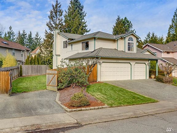 A French door off the kitchen provides access to the secluded backyard and deck. This home is a rare find with an additional separate driveway w/ easy access to backyard. Relax in the large master suite featuring a seating area, 5-piece bathroom, large walk-in closet and extra linen closet. Upstairs you will also find two additional guest rooms and full guest bathroom. This sought-after community offers 4 parks including one directly across the street, easy access to acres of gorgeous King County Parks and trails at your doorstep, as well as freeways, airport, hospital, major retail, dining & business hubs.