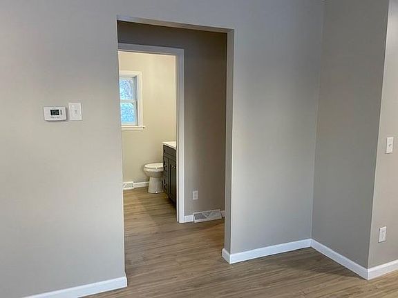 View from living room to hallway/bedrooms/bathroom