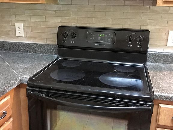 New tile back splash- 2 Y.O. Microwave