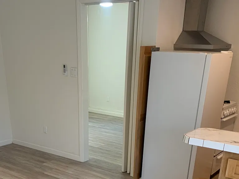 View from living room into bedroom.