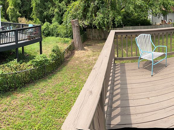 Panorama of the backyard and deck.