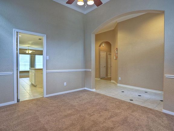 The formal dining has a crown molding and a nice chair rail.