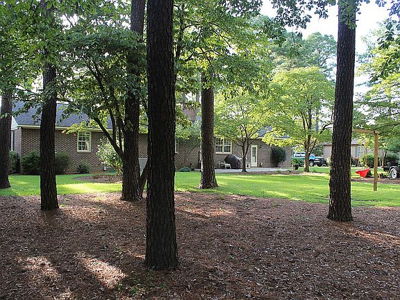 Rear of home and backyard
