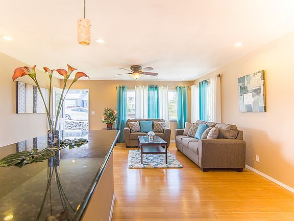 Dining room to living room and main door. **photo is before tenants moved in.