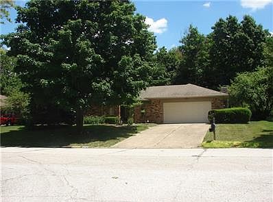 Front of the House with lots of Mature Trees