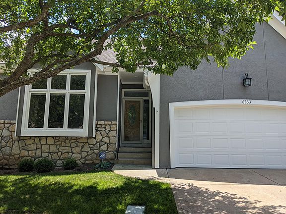 Two car garage. Second bedroom or office with attached bath and walk-in closet are to the left after you enter the home.