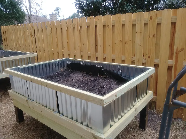 Lifted planting beds with
watering 
 system