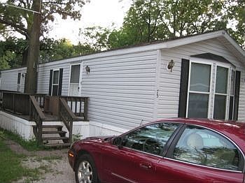 Front and Side of New Condition Home