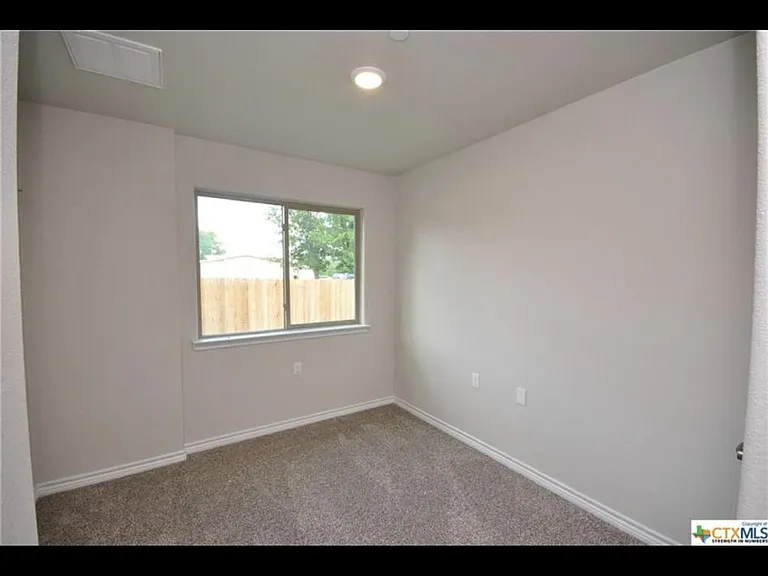 1st floor study with view of backyard