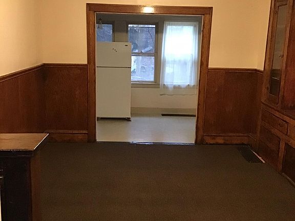 Dining room looking into bonus room off kitchen